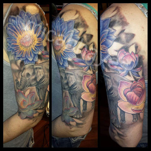 Explore cover up tattoo ideas black, creative tattoo ideas in Cheyenne, available at The T.R.I.B.E. Zoo, LLC Tattoo