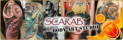 Explore black and grey sleeve tattoo ideas, creative tattoo ideas in Syracuse, available at Scarab Body Arts