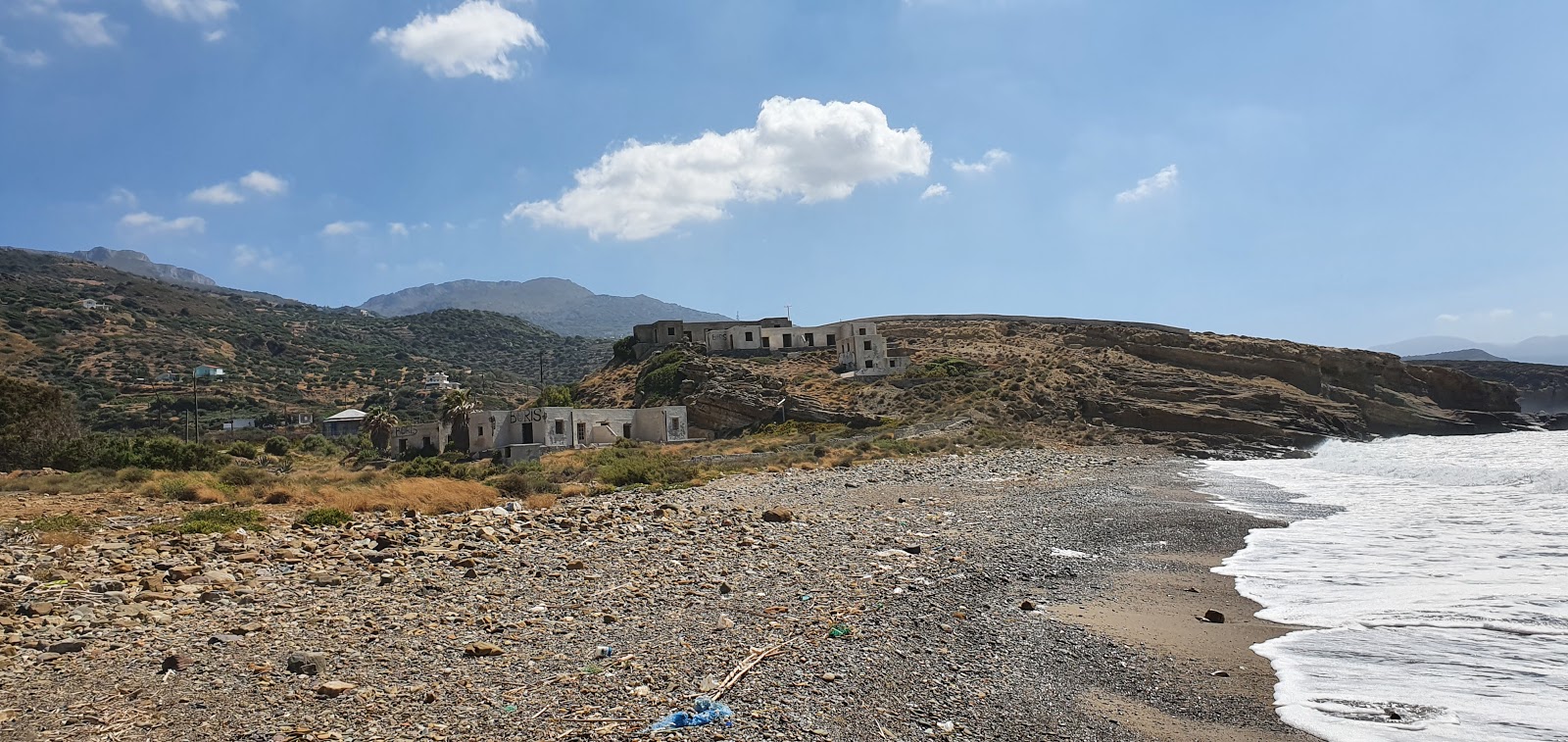 Photo of Agia Fotia with blue pure water surface