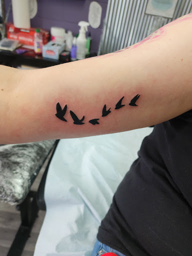 Explore february birth tattoo ideas, creative tattoo ideas in Dickinson, available at Creative InSight Tattoo