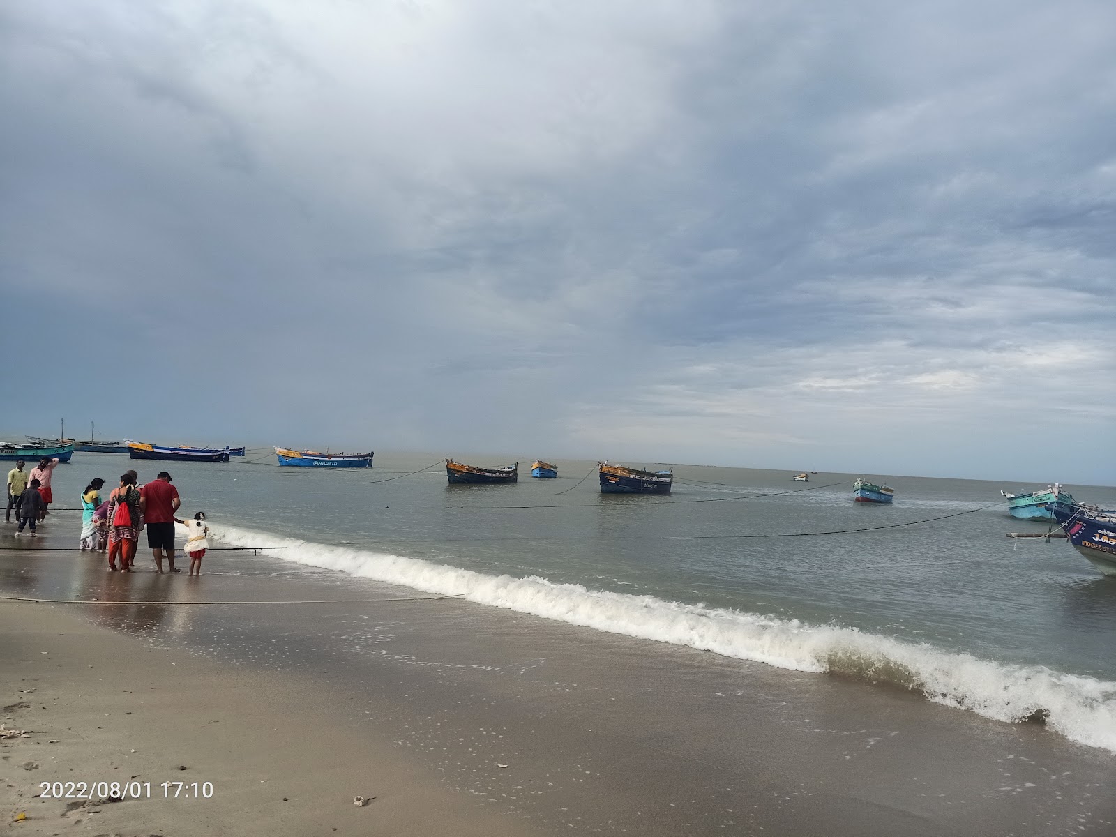 Foto van Thlamuthunagar Beach en de nederzetting