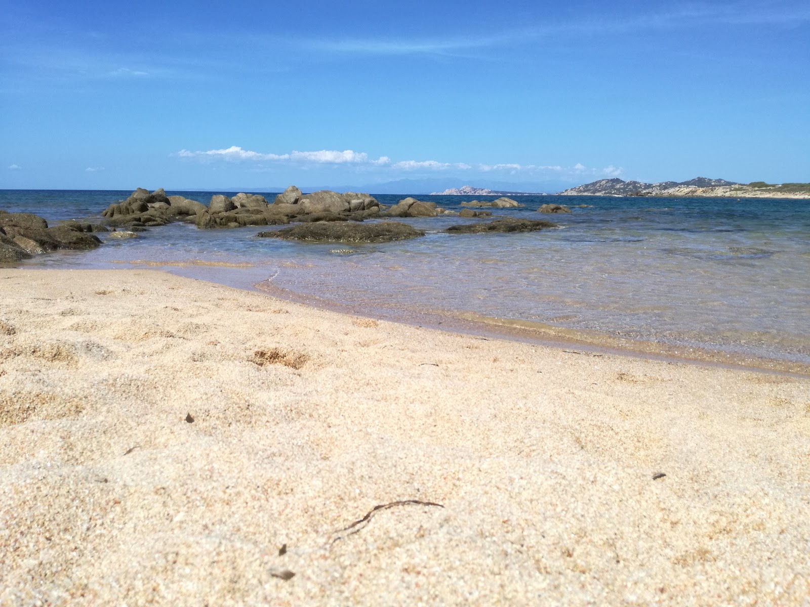 Foto von Cala Pischina - empfohlen für Familienreisende mit Kindern