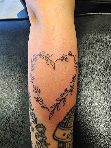 Explore rose tattoo ideas, creative tattoo ideas in Salt Lake City, available at AWS TATTOOS PIERCING