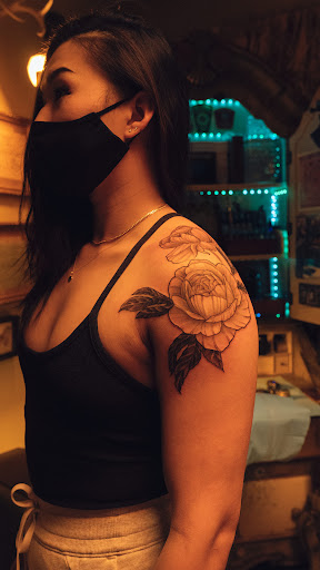 Explore apple tattoo ideas, creative tattoo ideas in Hudson, available at The Bohemian Social Club