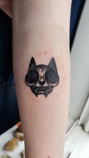 Explore the crow tattoo ideas, creative tattoo ideas in Milford, available at Golden Hammer Tattoo Studios