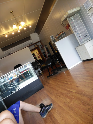 Tattoo Shop «Crimson Tattoos», reviews and photos, 106 W Main St, Owosso, MI 48867, USA