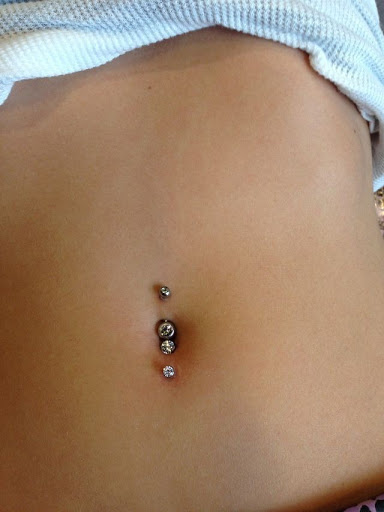 Explore tattoo ideas for family initials, creative tattoo ideas in Elko, available at Tom Custom Tattoos and Body Piercing Studio
