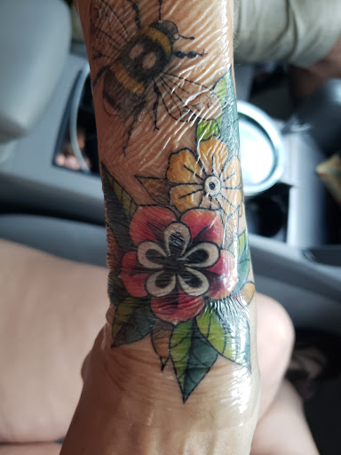 Explore calla lily tattoo ideas, creative tattoo ideas in Jensen Beach, available at Treasure Coast Tattoo Co.