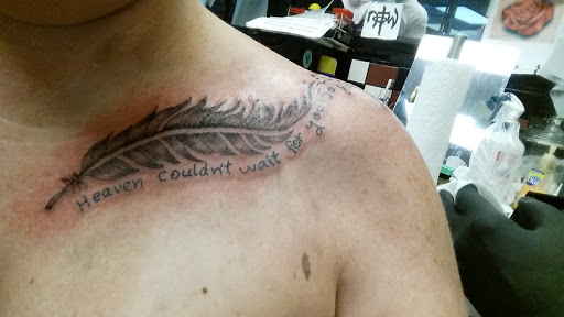 Explore negative space tattoo ideas, creative tattoo ideas in Longview, available at Fugis Tattoo Shop