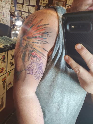 Explore mardi gras mask tattoo ideas, creative tattoo ideas in Huntsville, available at Blacktide Tattoo Co.