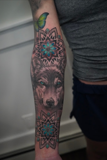 Explore hand tattoo ideas for men, creative tattoo ideas in Farmingville, available at LizArt Ink tattoo