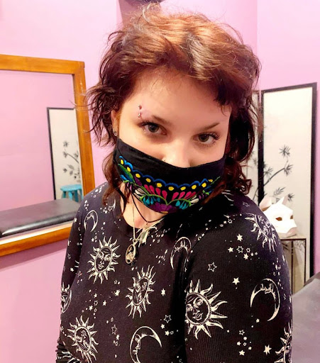 Find under breast tattoo ideas for your next unique tattoo in Bellingham at Old School Tattoo and Piercing