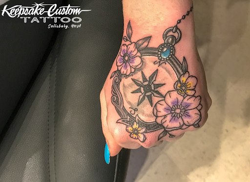 Find feminine skull tattoos ideas for your next unique tattoo in Salisbury at Keepsake Custom Tattoo & Body Piercing Laser Tattoo Removal
