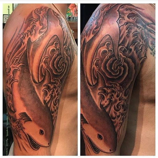 Explore hunger games tattoo ideas, creative tattoo ideas in Sacramento, available at American Graffiti Tattoo & Piercing