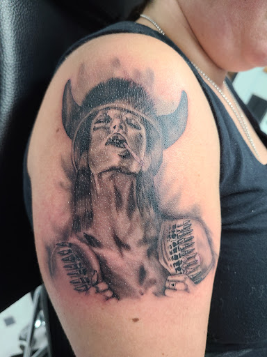 Explore hood tattoo ideas for men, creative tattoo ideas in Pahrump, available at Social Suicide Tattoos