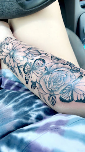 Explore face tattoo ideas for men, creative tattoo ideas in Graham, available at Tattoo Haus