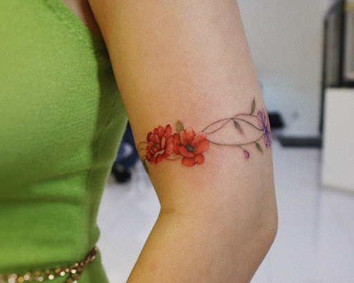 Explore letter b tattoo ideas, creative tattoo ideas in Orange, available at Baron Art Tattoo