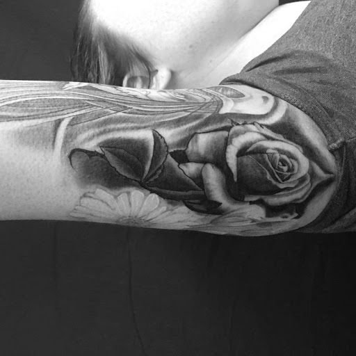 Explore cover up tattoo ideas male forearm, creative tattoo ideas in Santa Rosa, available at Eternal Art Tattoo Gallery