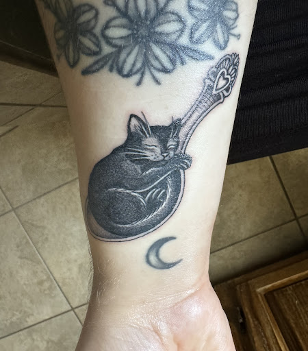 Explore music tattoo sleeve ideas, creative tattoo ideas in Eureka, available at Sangha Tattoo Studio