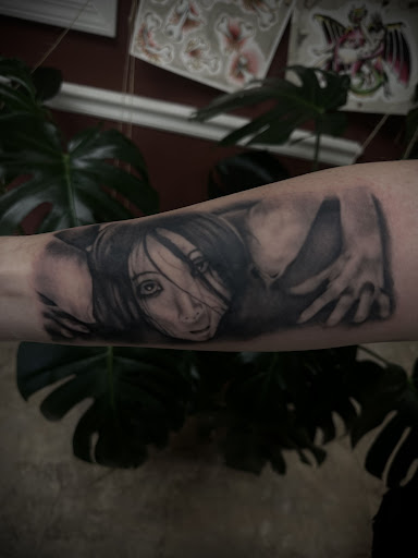 Explore tattoo ideas for female arm, creative tattoo ideas in Nashville, available at RedBird Tattoo