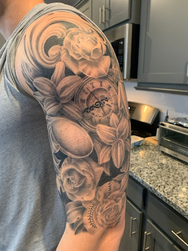 Explore tattoo ideas for men leg, creative tattoo ideas in Cary, available at Double Deuce Tattoo and Art Gallery