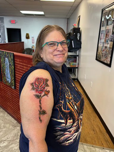 Explore tattoo ideas to cover up a name, creative tattoo ideas in Seymour, available at American Gypsy Tattoo Corp.