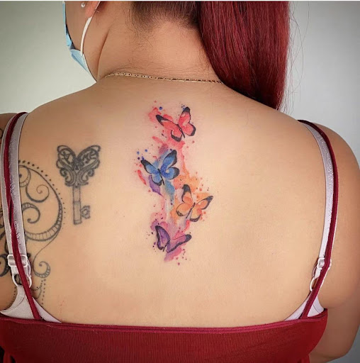 Explore simple line tattoo ideas, creative tattoo ideas in Orange, available at Baron Art Tattoo