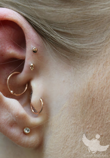 Explore men shoulder tattoo ideas, creative tattoo ideas in Syracuse, available at Scarab Body Arts