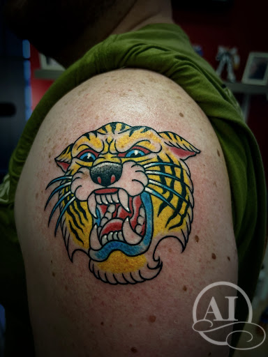 Explore graduation cap tattoo ideas, creative tattoo ideas in Katy, available at Artistic Impressions Tattoo Studio