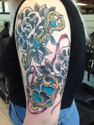 Tattoo Shop «Attitudes Muskegon», reviews and photos, 1610 Evanston Ave, Muskegon, MI 49442, USA