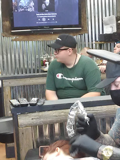 Explore let them hand tattoo ideas, creative tattoo ideas in Belleville, available at Almighty Tattoos