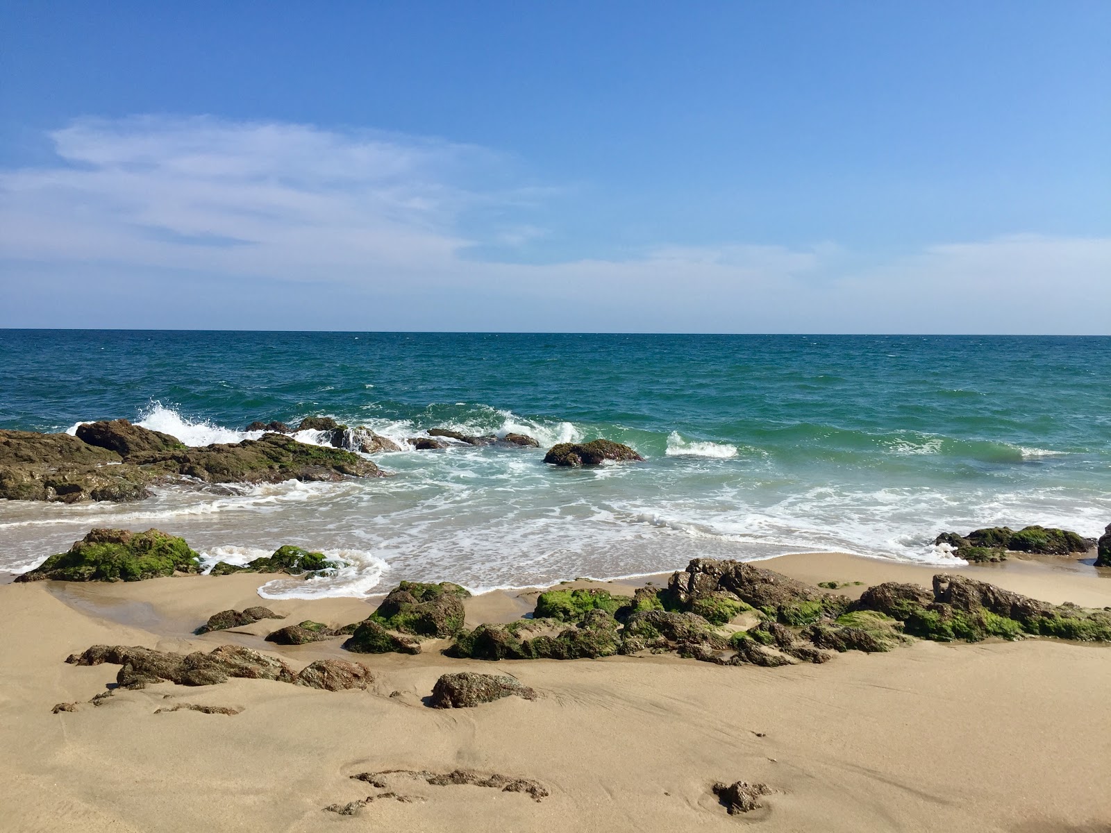 Foto von Palapa May mit türkisfarbenes wasser Oberfläche