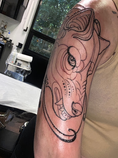 Explore one piece tattoo ideas for guys, creative tattoo ideas in Marietta, available at Mystic Owl Tattoo