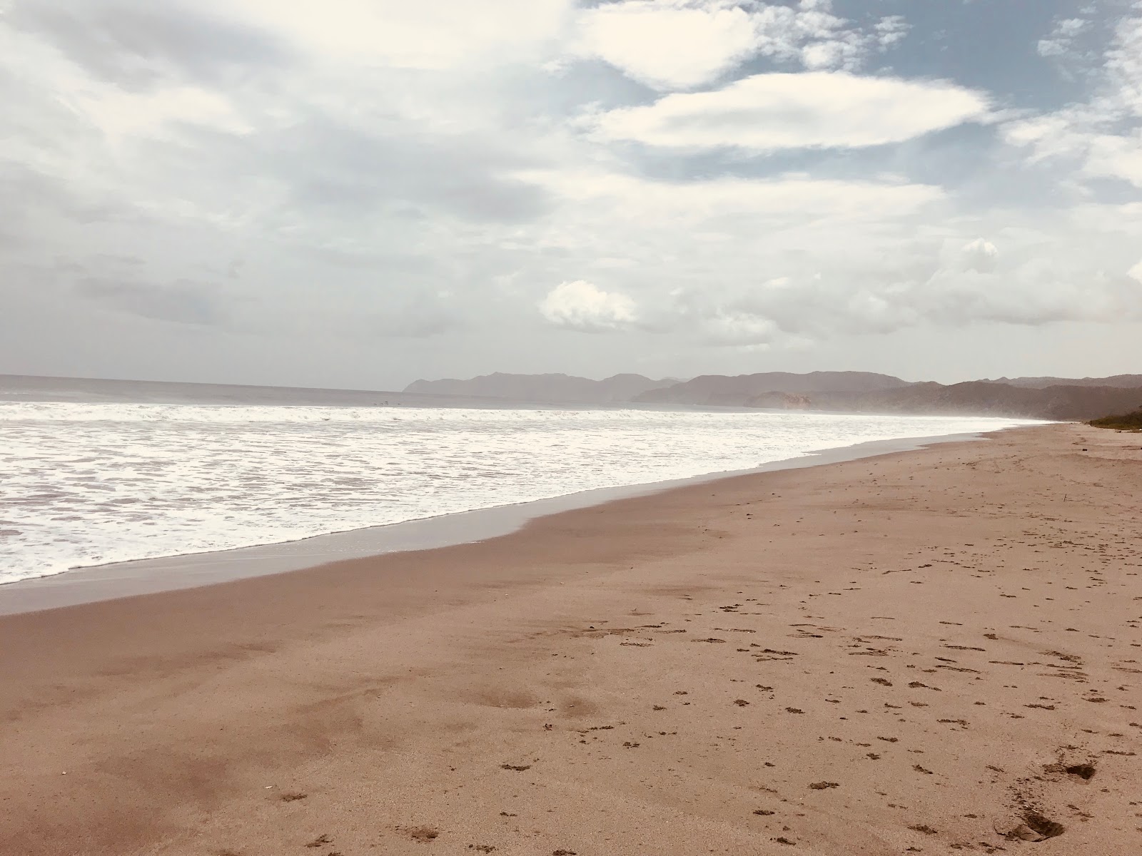 Naranjo beach II的照片 带有长直海岸