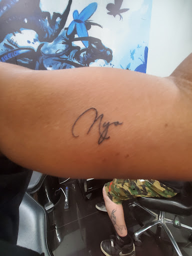 Explore communist tattoo ideas, creative tattoo ideas in Addison, available at Cat Tattoo