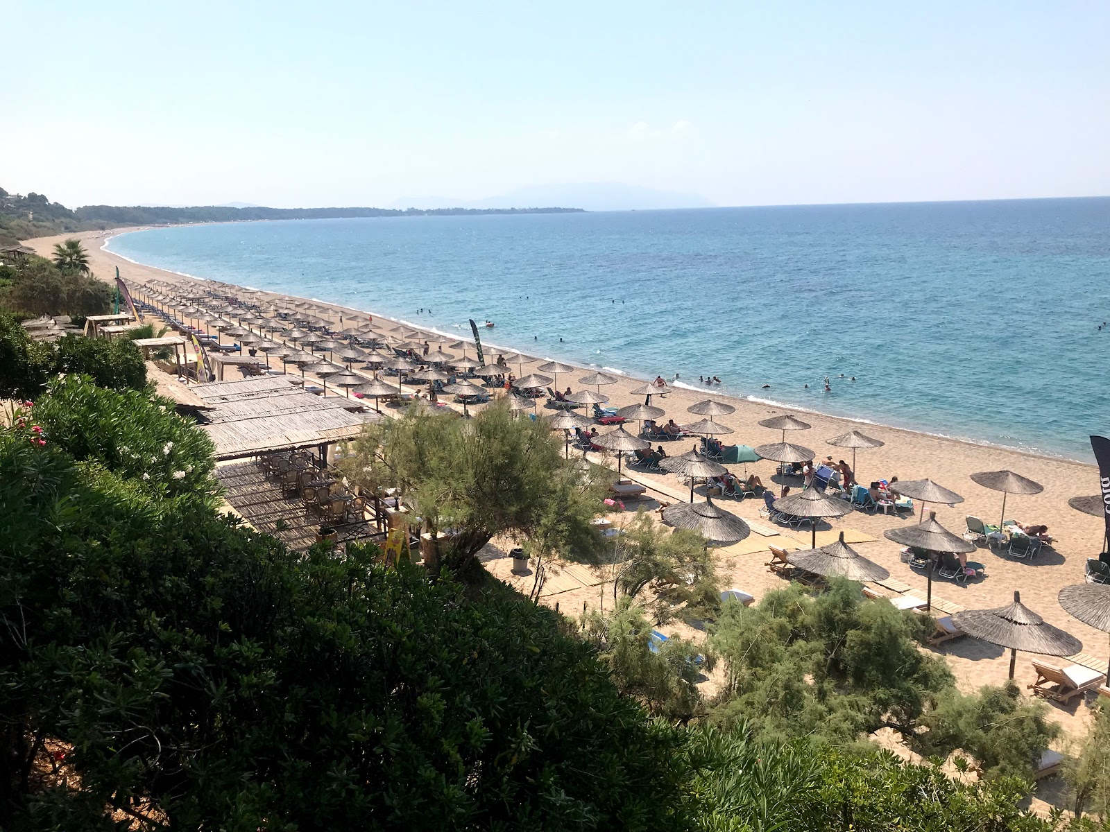 Photo of Monolithi beach with green pure water surface