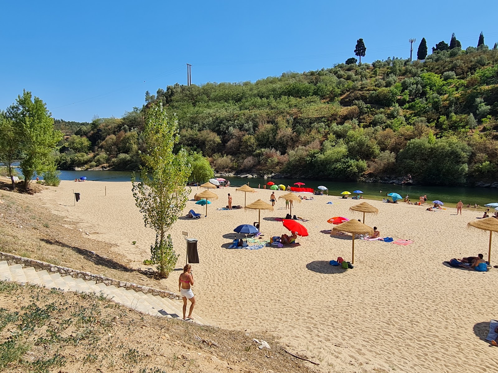 Foto von Praia de Constancia mit beiger sand Oberfläche
