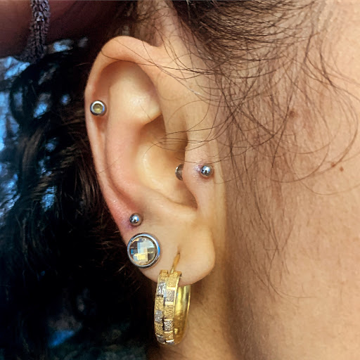 Explore cute cross tattoo ideas, creative tattoo ideas in Round Rock, available at Piercings by Toni