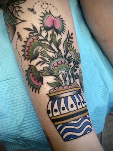 Explore mom sleeve tattoo ideas, creative tattoo ideas in New Orleans, available at TOUGH LOVE TATTOOS