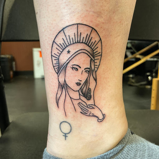 Explore unique tramp stamp tattoo ideas, creative tattoo ideas in Saint Petersburg, available at Foolish Pride Tattoo Co.