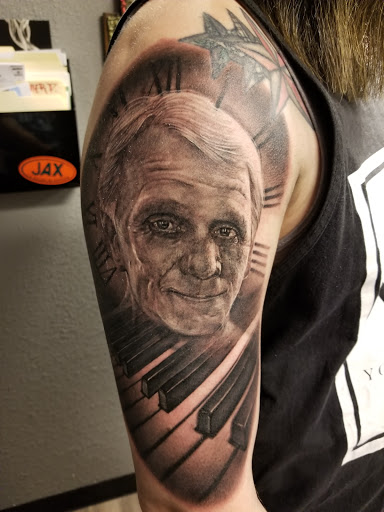 Explore palm tree tattoo ideas, creative tattoo ideas in Pueblo, available at Spellbound Electric Tattoos