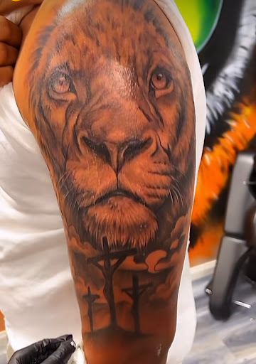 Explore thigh tattoo ideas, creative tattoo ideas in Tampa, available at Five Star Tattoos