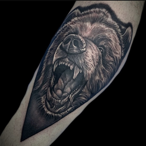 Explore tribal tattoo ideas and meanings, creative tattoo ideas in Altoona, available at Catharsis Tattoo Gallery
