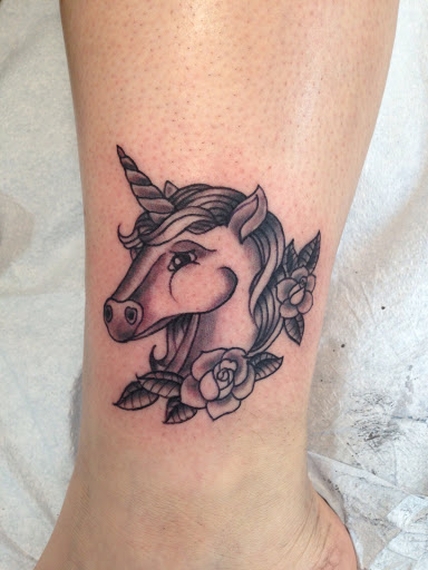 Find paradox tattoo ideas for your next unique tattoo in Bellevue at Skin and Soul Tattoo & Piercing