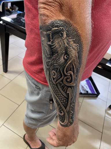 Explore hawaiian tattoo ideas, creative tattoo ideas in Sarasota, available at SEVEN SINS Tattoo Studio