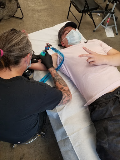 Explore foot tattoo ideas for men, creative tattoo ideas in Denver, available at Denver City Tattoo Club