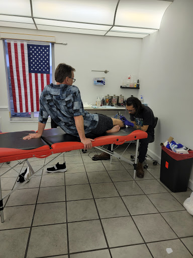 Explore waist tattoo ideas, creative tattoo ideas in Daytona Beach, available at Studio 21 Tattoo & Piercings Daytona Beach