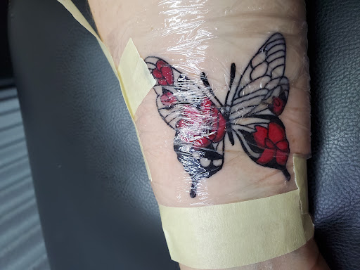 Explore tattoo cover up ideas on leg, creative tattoo ideas in League City, available at Zen Body Art & Adornment Tattoo Shop