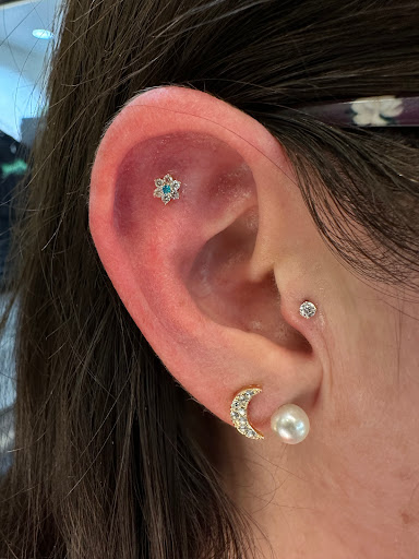 Explore october birth flower tattoo ideas, creative tattoo ideas in Chandler, available at Modern Mods Body Piercings - Chandler