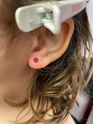 Explore pretty flower tattoo ideas, creative tattoo ideas in Ypsilanti, available at Concierge Ear Piercing LLC